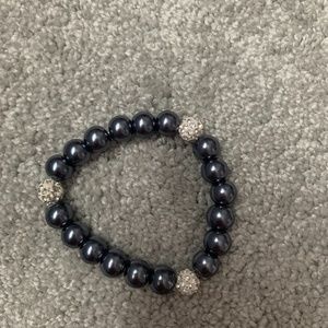 Black beaded bracelet with silver beads